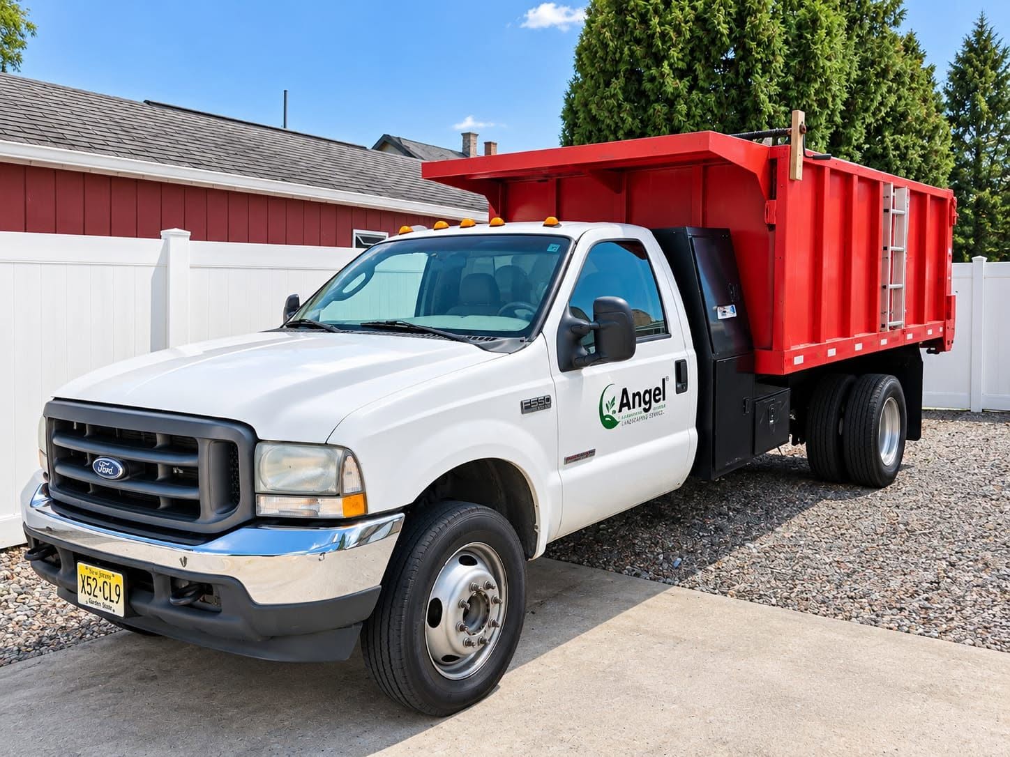 Angel Landscaping Services Ford F-550 dump truck parked at a Manville, NJ property